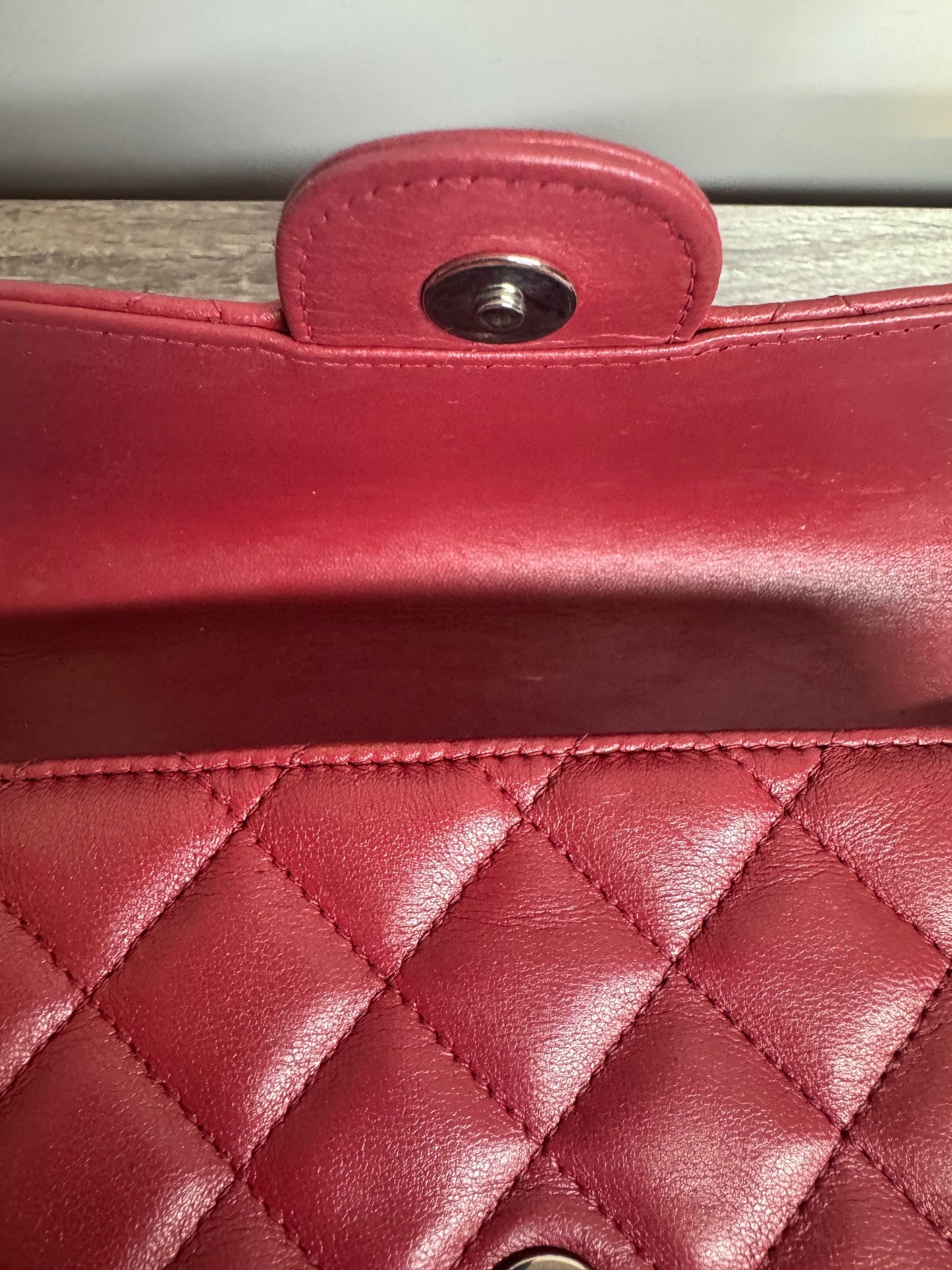 Preloved Chanel - Mark Mini Red lambskin leather Pouch. Silver tone hardware.