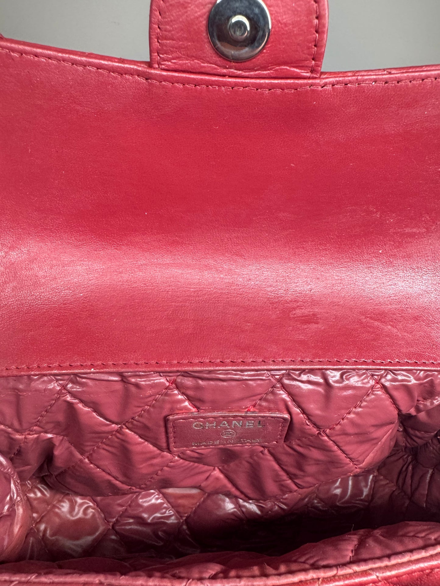 Preloved Chanel - Mark Mini Red lambskin leather Pouch. Silver tone hardware.