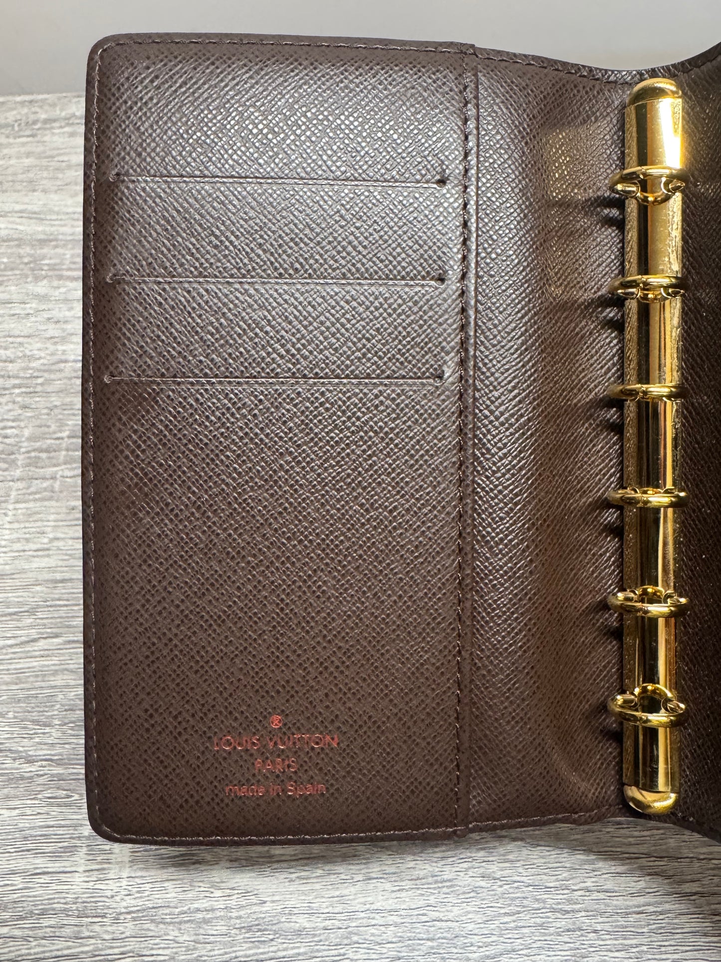 Preloved Louis Vuitton PM ring Agenda in Damier Ebene.