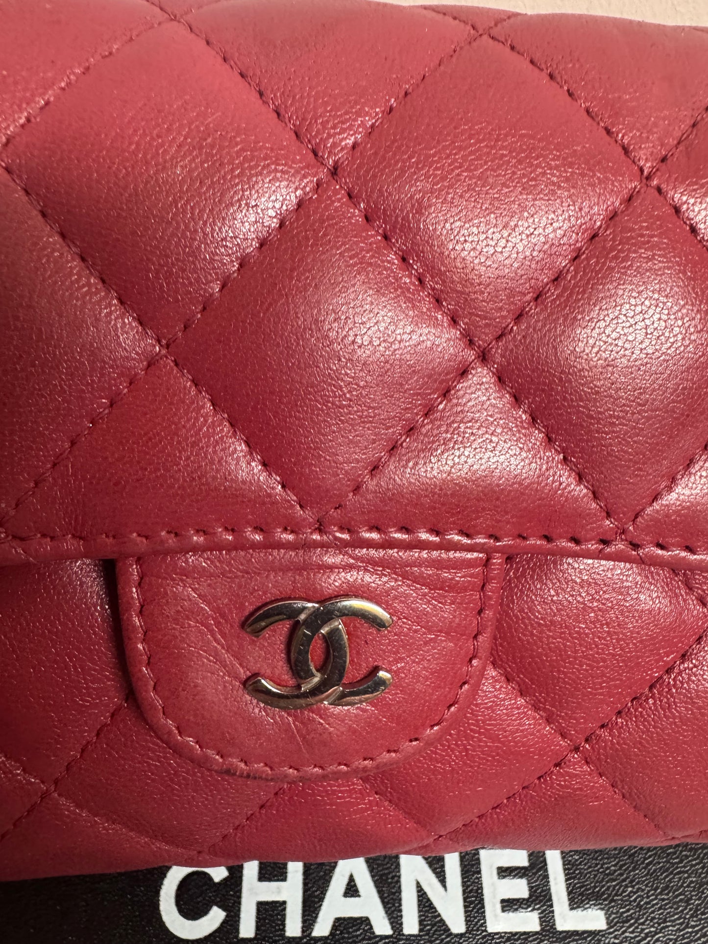Preloved Chanel - Mark Mini Red lambskin leather Pouch. Silver tone hardware.