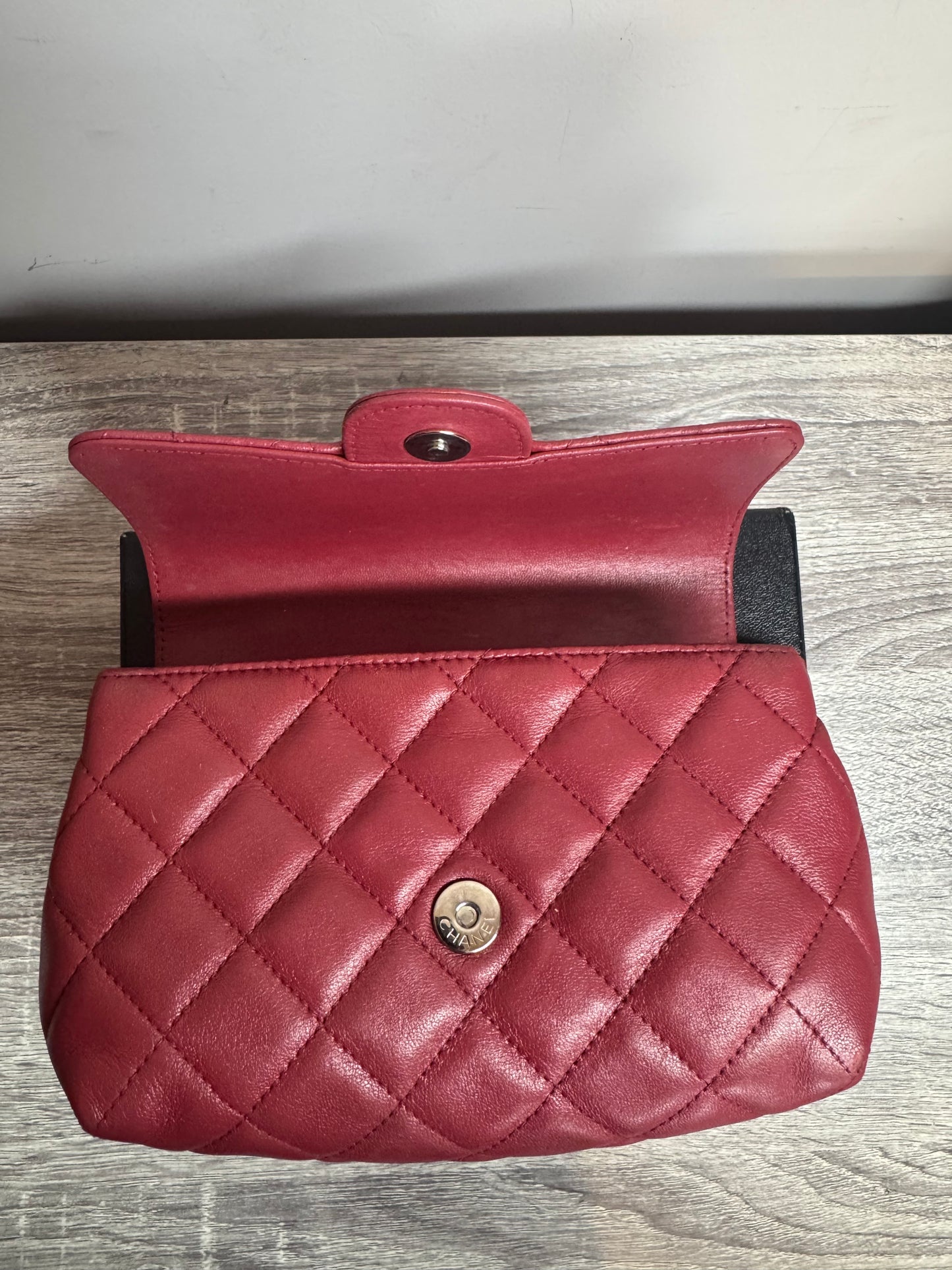 Preloved Chanel - Mark Mini Red lambskin leather Pouch. Silver tone hardware.