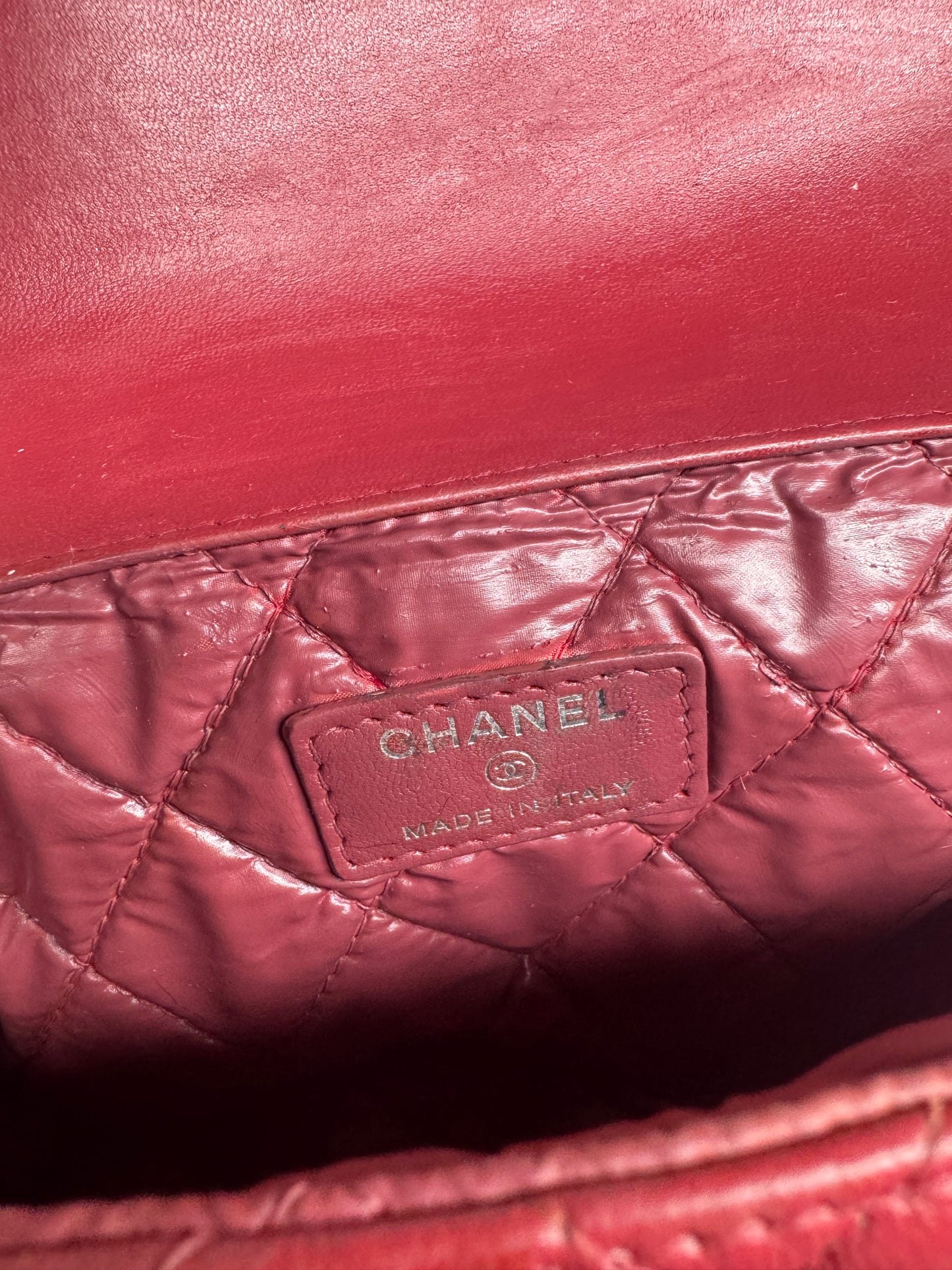 Preloved Chanel - Mark Mini Red lambskin leather Pouch. Silver tone hardware.